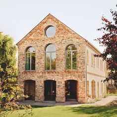 an old brick building with arched windows