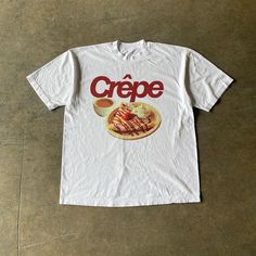 These Vintage Food Graphic Print T-Shirts are the perfect way to impress your pals. Coming in four menu options - including Crepes, Kimchi, Sushi and Potato Soup - you'll have a culinary masterpiece on your chest! While you can't eat them, you'll look as delicious as the shirt. Yum! Gender: UNISEXItem Type: Tops & Tees Pattern Type: Letter, Food Graphic Pattern Them: Funny Material: Cotton/Polyester Elasticity: Slight Stretch Collar: O-Neck SIZE CHART Size (CM) Chest Length Shoulder Sleeve S 96 Diy Outfits, Dr Closet, Vintage Food, Food Clothes, Old T Shirts, Graphic Tops, Collars For Women, Vintage Recipes, Sleeveless Vest