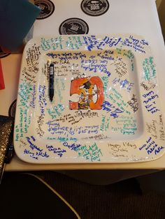 a tray with writing on it sitting on a table