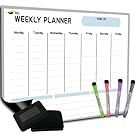 the weekly planner is on display with markers