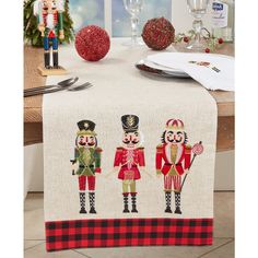 three nutcrackers sitting on top of a table