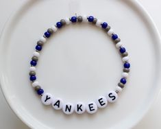 NY Yankees game day bracelets! Your choice between one, two, or all three! - - SIZING - - Every piece is made just for you! Our standard size fits a 6 inch wrist (measures 6.5 inches total length), but can be adjusted upon request. Please leave your desired size in the 'Notes' section upon checkout. Yankees Game, Team Bracelets, Baseball Bracelet, Base Ball, Yankees Baseball, Ny Yankees, Pokemon Cards, Things To Buy, Game Day