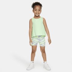 This 2-piece set is sure to make your little athlete stand out on the playground! The tank top features modern pleated detailing that creates an elevated look while adding breezy movement. The Swooshtastic bike shorts have a stretch waistband for a nice fit and both pieces are enhanced with quick-drying, moisture-wicking Dri-FIT technology to help little ones stay comfy and keep the pep in their step. Playful Summer Activewear For Gym, Playful Summer Gym Activewear, Nike Summer Athleisure Activewear, Nike Athleisure Activewear For Summer, Nike Summer Activewear With Go-dry Technology, Playful Summer Activewear, Sporty Summer Tops For Playwear, Summer Sportswear Tops For Playwear, Playful Summer Workout Activewear