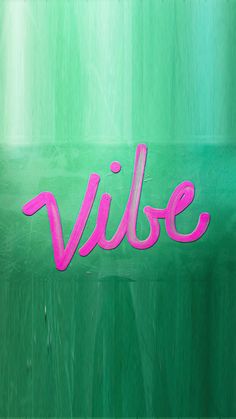 the word vibe is painted in pink on a green background