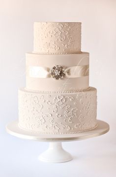 wedding cake with just married sign on top