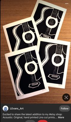 four black and white stickers with guitars on them