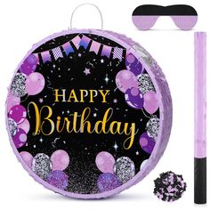 a purple birthday cake with sunglasses on the top and some confetti around it