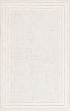 a white rug with stripes on it