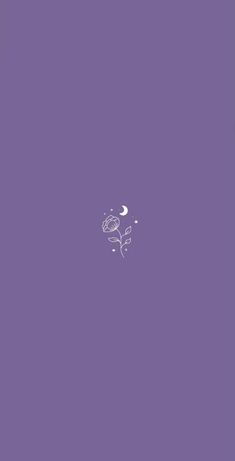 a purple wall with a white flower and moon in the sky on it's left side