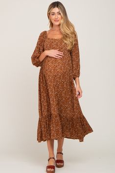 A comfortable & casual maternity dress perfect for any day!  A floral printed maternity midi dress with a squared neckline, 3/4 length sleeves, a gathered bottom tier, and a back zipper closure. The Camel Floral 3/4 Sleeve Maternity Midi Dress is perfectly bump-friendly! Fall Baby Shower Dresses, Maternity Dresses Fall, Fall Baby Shower Outfits For Mom To Be, Fall Baby Shower Dress For Mom, Fall Baby Shower Outfit For Mom, Fall Baby Shower Dress, Maternity Dress Fall, Fall Maternity Dress, Baby Shower Outfit Ideas