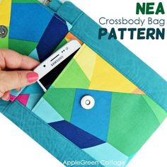 a hand holding a cell phone in a colorful bag with the text nea cross body bag pattern on it