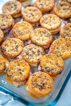 there are many small pastries in the dish on the table, ready to be eaten