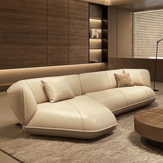 a modern living room with white leather furniture