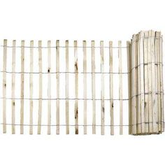 a wooden fence that is next to a piece of metal wire on a white background