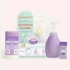 the contents of a baby's gift set including bottles, diapers and wipes