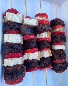 strawberries and chocolate brownies on skewers with marshmallows