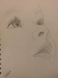 a pencil drawing of a woman's face with her eyes closed and one eye open