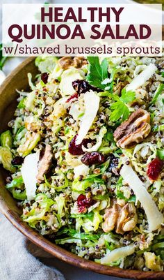 a bowl of brussels quinoa salad. Shaved Brussels Sprouts Recipe, Raw Brussel Sprouts, Shredded Brussels Sprouts Salad, Instant Pot Quinoa Recipes, Cranberry Quinoa, Healthy Quinoa Salad, Cranberry Quinoa Salad, Shredded Brussel Sprout Salad, Shredded Brussels Sprouts