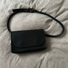 Like New Black Leather Waist Bag. Perfect Small Bag For A Classic Look. Classic Leather Belt Bag For On-the-go, Black Crossbody Belt Bag For Everyday, Black Crossbody Belt Bag, Black Rectangular Soft Leather Belt Bag, Everyday Leather Clutch Belt Bag, Everyday Rectangular Soft Leather Belt Bag, Classic Black Belt Bag With Removable Pouch, Classic Black Pouch Belt Bag, Classic Black Belt Bag With Detachable Strap