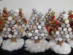 three christmas trees made out of wine corks