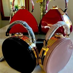 Round Patent Leather Shaped Handbag With Gold Hardware And Jeweled Closure. Handle On Top. Shoulder Strap Included. Hello Kitty Makeup Bag, Unusual Handbags, Dress Bags, Orange Handbag, Patent Leather Dress, Round Purse, Fall Handbags, Patent Leather Handbags, Vanity Bag