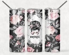 two tumbles with flowers on them and the words momlife written in white lettering