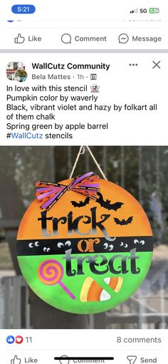 an image of a sign that says trick or treat with bats and pumpkins on it