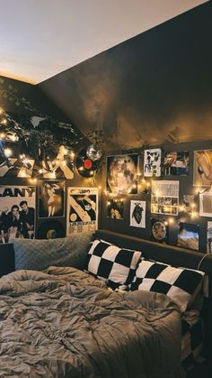 a bedroom with pictures and lights on the wall