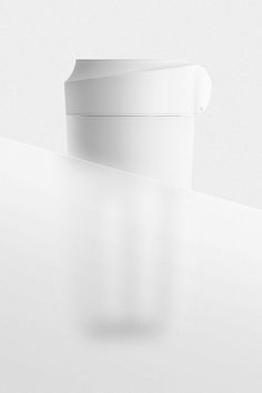 a white object is sitting on top of a table and it appears to be curved