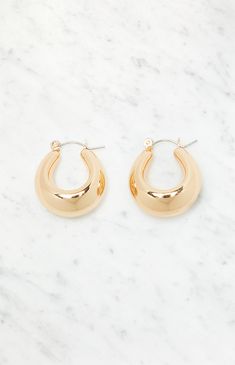 LA Hearts introduces the Chunky Oval Hoop Earrings, offering a bold and fashionable design with a striking oval shape. These statement earrings are perfect for adding a touch of drama to any outfit.


	Chunky hoop
	Omega closure
	Gold finish Chunky Hoop Earrings Gold, Chunky Hoop Earrings Outfit, Chunky Hoops Earrings, Chunky Gold Earrings, Hoop Earring Outfit, Oval Hoop Earrings, Chunky Hoop Earrings, Chunky Earrings, Birthday Board