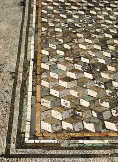 a close up of a street with a rug on the ground