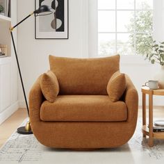 a living room scene with focus on the chair and floor lamp in the foreground