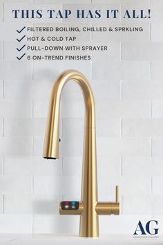 the faucet has been installed on this wall and it is gold in color