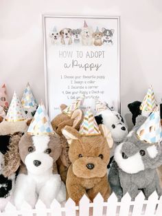 a group of stuffed animals wearing party hats