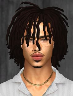 a man with dreadlocks and a white shirt