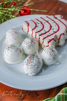 some white and red desserts on a plate