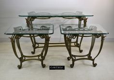 three tables with glass tops and metal legs