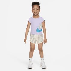 Your little one will be a happy camper in this 2-piece performance set. The tee is made of knit fabric and the matching shorts are made of lightweight woven fabric, have an encased elastic waistband for a comfy fit and a built-in liner providing full coverage during every run, jump and skip. Additionally, both pieces are enhanced with quick-drying, moisture-wicking Dri-FIT technology to keep kiddos cool and dry while they play. Ready, set, GO! Short Cotton Tops For Sports, Playful Cotton Sports Shorts, Casual Moisture-wicking Tops For Playwear, Moisture-wicking Cotton Activewear For Casual Wear, Summer Athleisure T-shirt For Playwear, Short Sleeve Activewear For Outdoor Summer Activities, Summer Outdoor Activewear With Short Sleeves, Sportswear Tops For Playwear, Summer Cotton Activewear With Short Sleeves