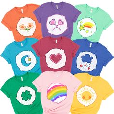 the children's t - shirts are all different colors and have pictures on them