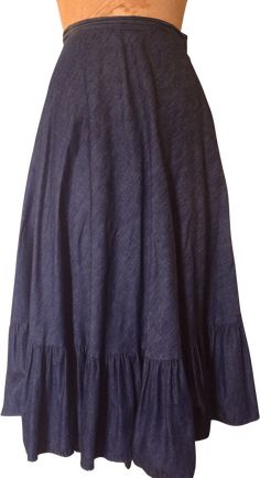 Beautiful vintage denim prairie skirt w/ ruffled hem. In great vintage condition~very light weight and soft, great summer skirt! Measurements taken flat: waist: 13. 5" length: 33. 5" Cotton Tiered Denim Skirt With Ruffles, Fitted Denim Skirt With Ruffles, Spring Long Skirt With Ruffle Hem, Medium Wash Denim Tiered Skirt, Casual Summer Maxi Skirt With Frayed Hem, Denim Blue Ruffled Cotton Skirt, Fitted Denim Ruffled Skirt, Medium Wash Ruffled Skirt For Spring, Denim Blue Cotton Skirt With Ruffles