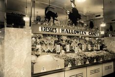 an old black and white photo of kreeges's halloween candy store front