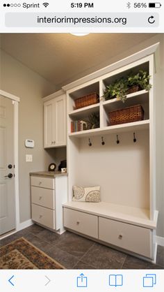 an image of a room with white cabinets