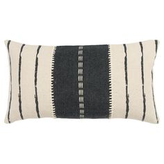 a black and white striped pillow on a white background