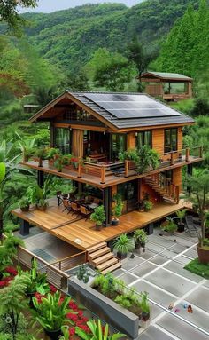 a house that is surrounded by trees and plants