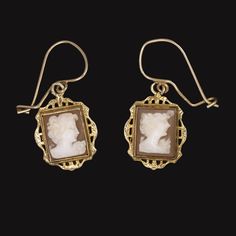 Why we love it:These lovely vintage earrings feature gorgeous carved cameo profiles. The cameos have a romantic air with coiffed hair and floral details, and they are framed in beautifully detailed 14k yellow gold.Highlights:- Original vintage- Elegant 14k yellow gold framesDimensions:16.3 x 13.1mm pendant Cameo Earrings, Vintage Cameo, Vintage Elegant, Vintage Earrings, Gold Frame, Jewelry Earrings Dangle, Vintage Items, Dangle Drop Earrings, Dangle Earrings