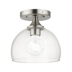 a light fixture with a clear glass dome