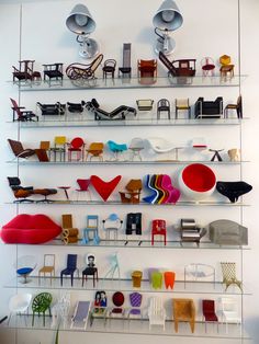 the shelves are filled with different types of chairs and tables in varying shapes, sizes and colors