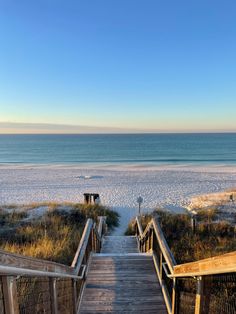 stairs lead down to the beach and ocean