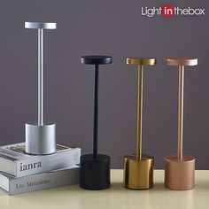 three different types of table lamps sitting on top of each other