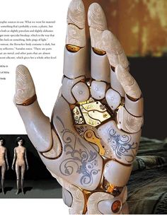 an image of a human hand with tattoos on it